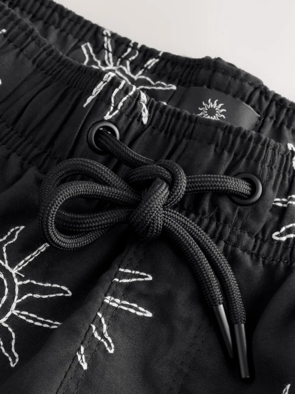Black Embroidered Swim Shorts