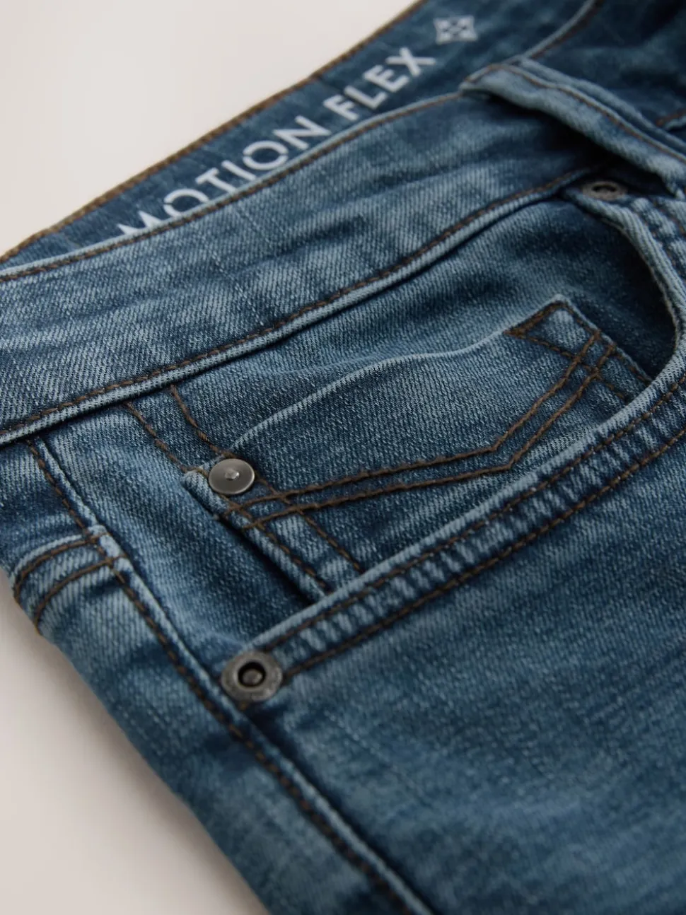 Blue Light Straight Fit Motionflex Jeans