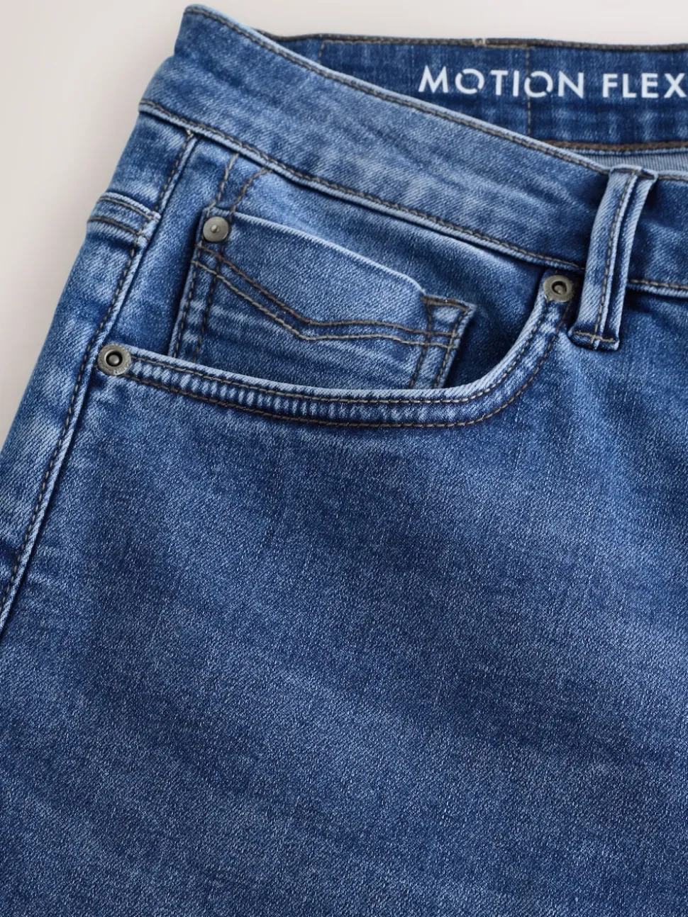 Blue Mid Regular Tapered Fit Motionflex Jeans