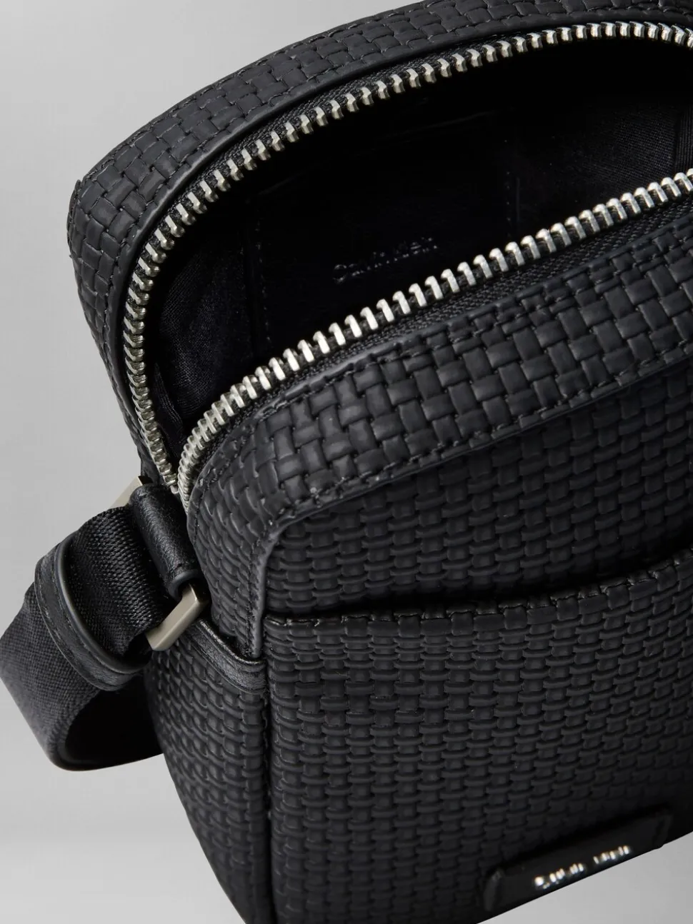 Calvin Klein Black Embossed Woven Slim Reporter Bag