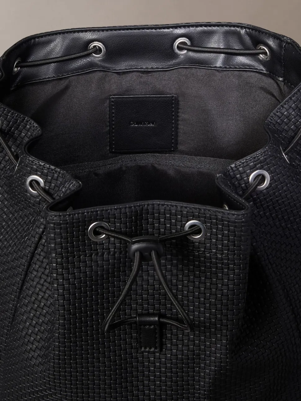 Calvin Klein Black Embossed Woven Flap Backpack