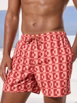 Coral Pink Sun Geometric Printed Swim Shorts