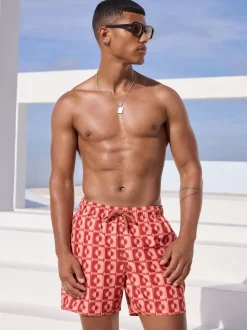 Coral Pink Sun Geometric Printed Swim Shorts