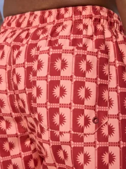 Coral Pink Sun Geometric Printed Swim Shorts