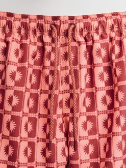 Coral Pink Sun Geometric Printed Swim Shorts