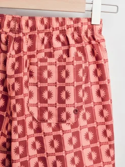 Coral Pink Sun Geometric Printed Swim Shorts